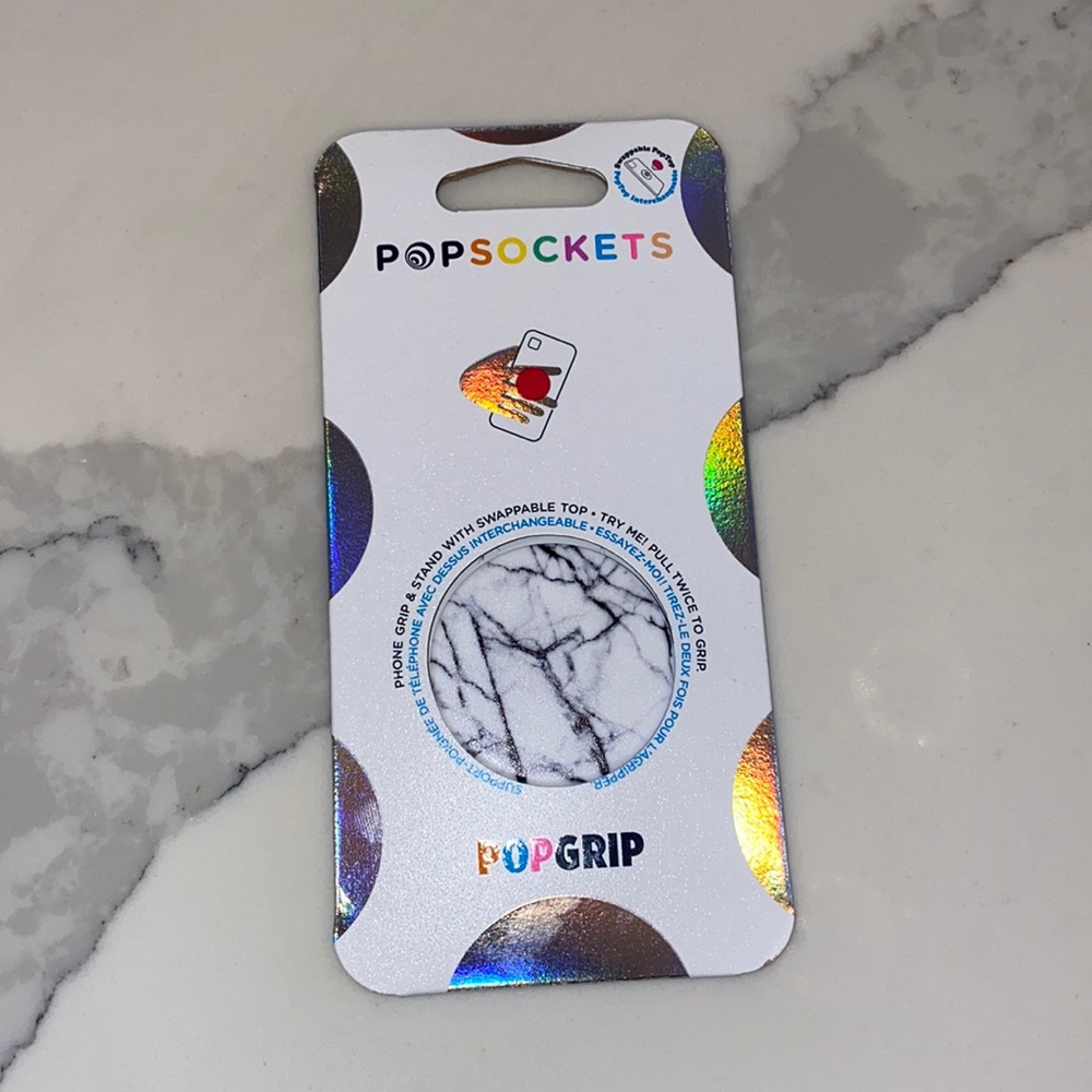 Brand new marble pop socket still in its original packaging